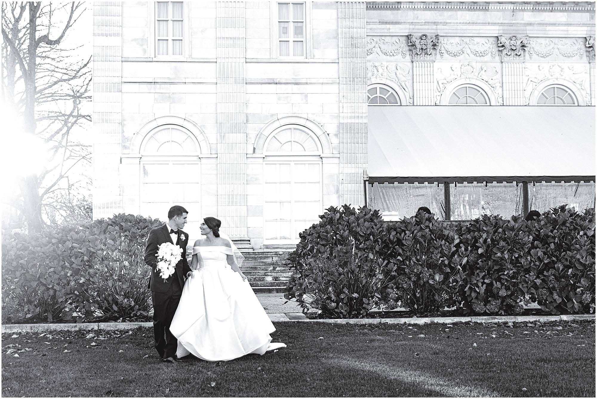 black and white photo of bride and groom at Marble House at sunset Newport resort wedding