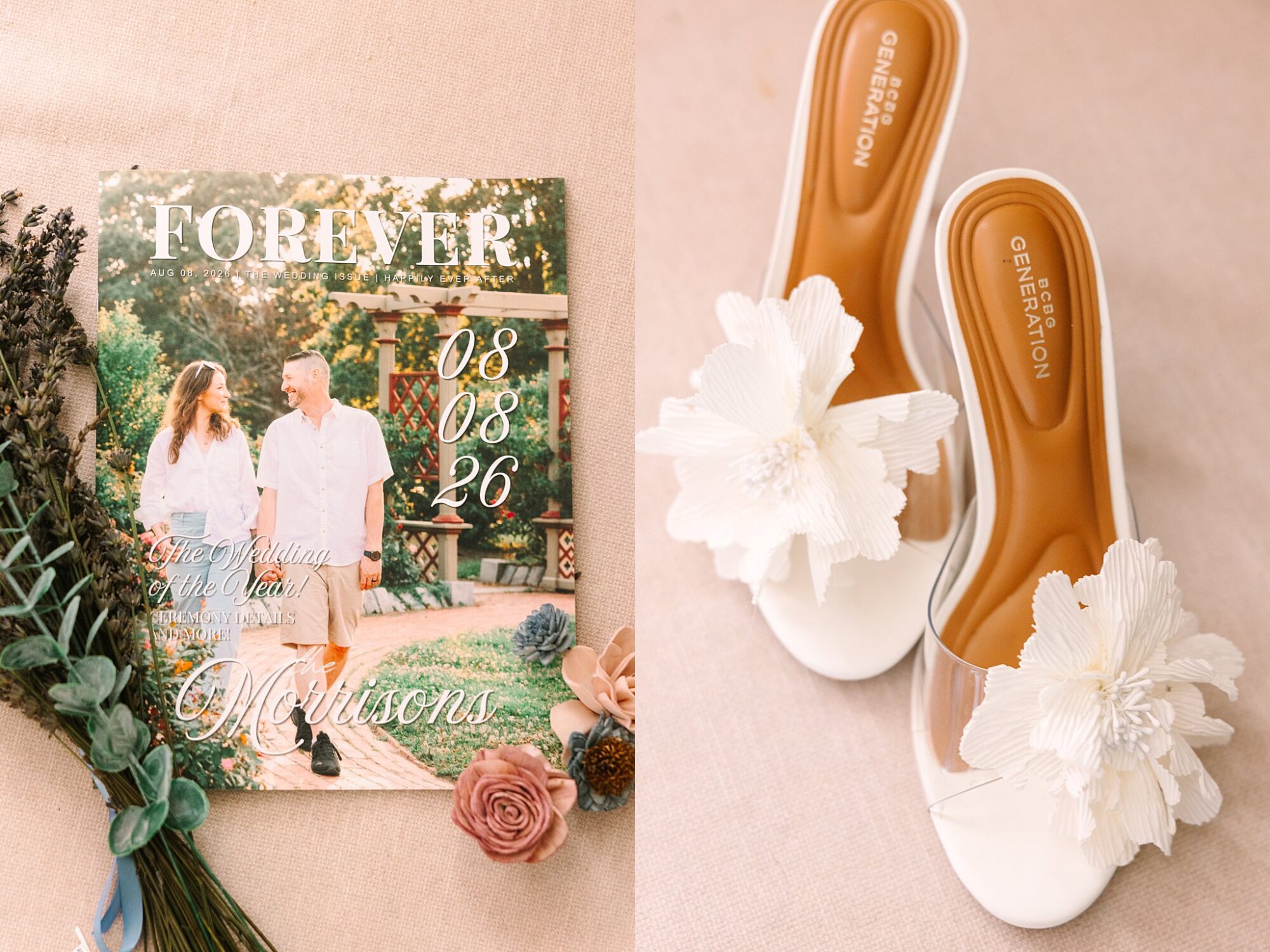 A wedding invitation with a couples photo beside white floral bridal shoes, surrounded by flowers and greenery on a beige fabric background.