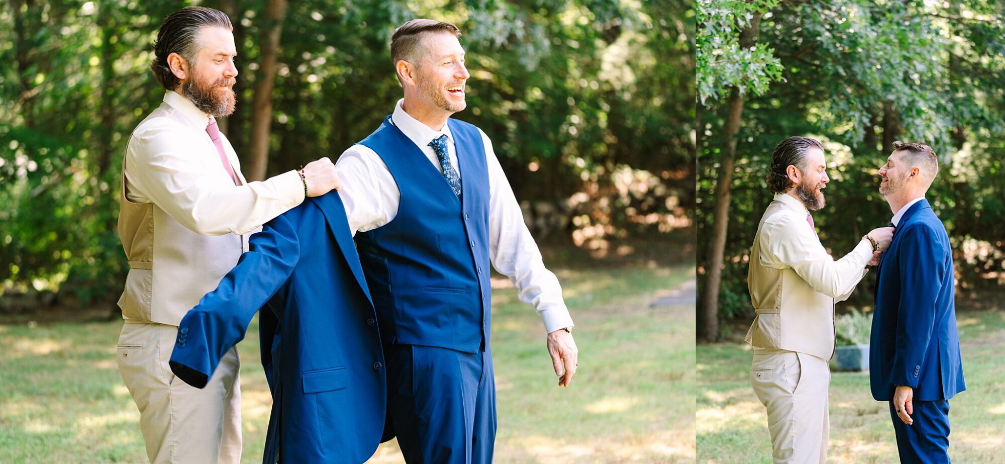 Two men stand outside; one helps the other put on a blue suit jacket. Both are smiling and appear to be preparing for a formal event in a sunlit, wooded area.