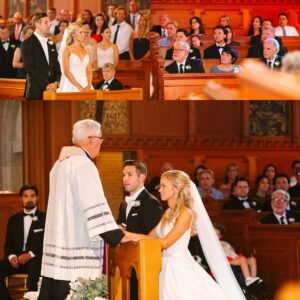 A bride and groom stand at the altar in a church, facing a priest. Guests, dressed formally, are seated and watching the ceremony attentively. The church has wooden pews and ornate decor.