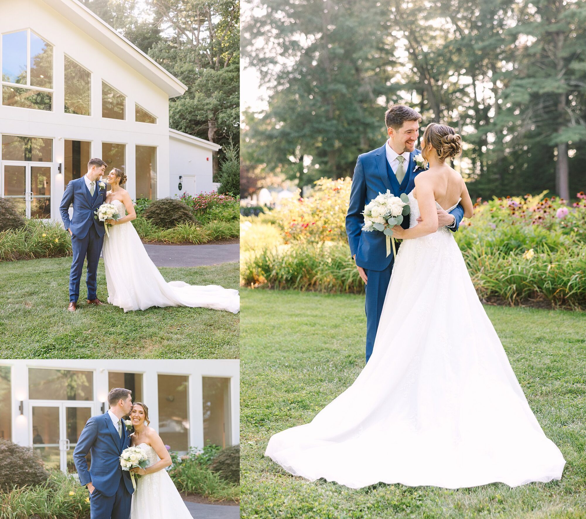 A bride and groom in formal wedding attire pose happily outside a modern house with large windows and in a garden. The bride wears a white gown and holds a bouquet, while the groom wears a blue suit.